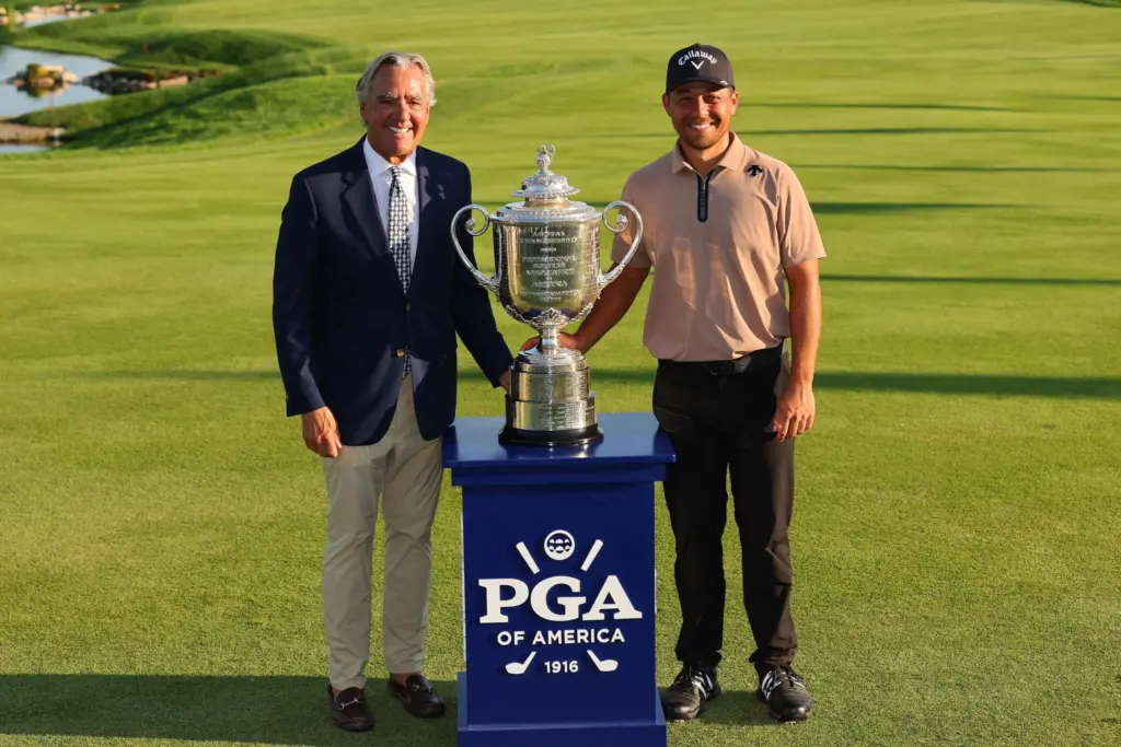 PGA Championship winner stands with the Wanamaker Trophy after a major victory.
