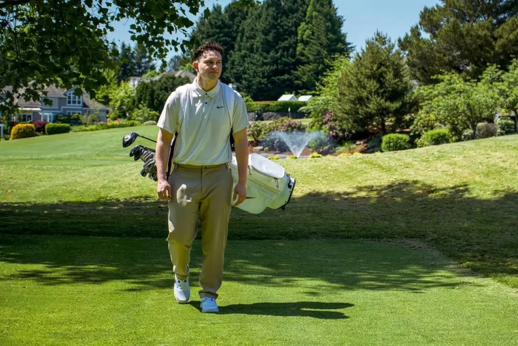 Golfers wear collared polos and khaki pants on the course.