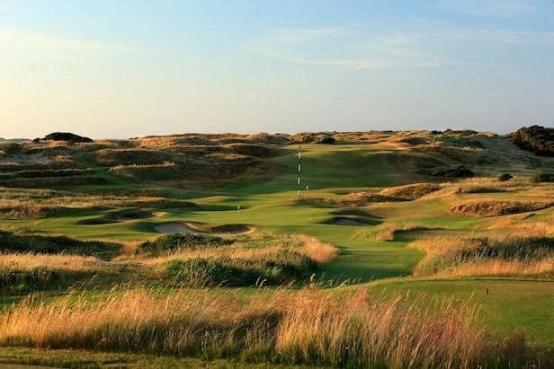 Tall fescue rough shapes traditional links-style golf along coastal courses.